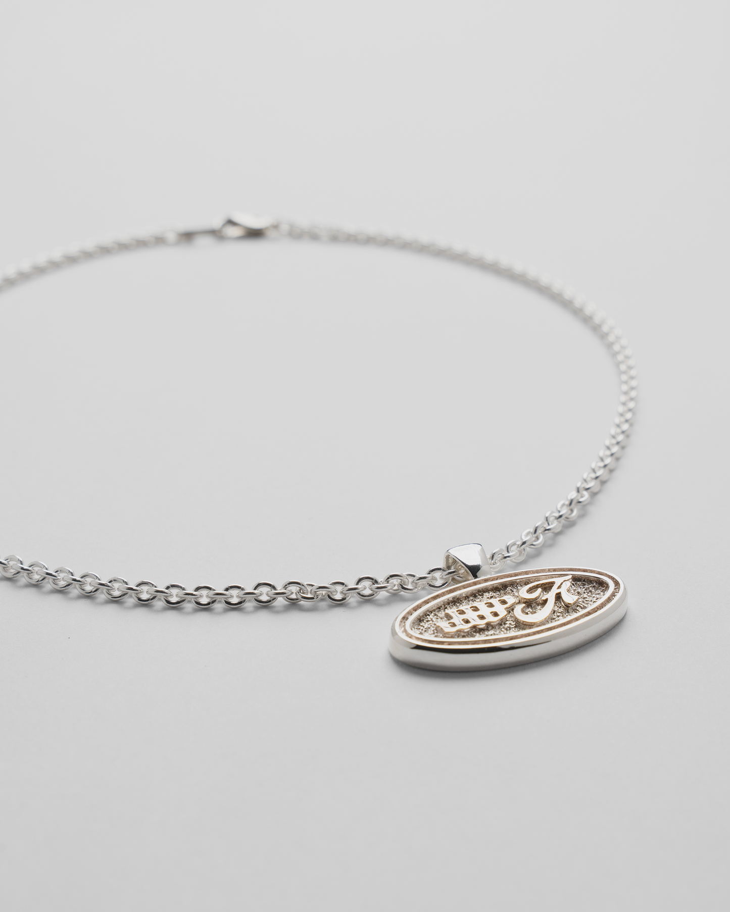 Emblem Necklace GT